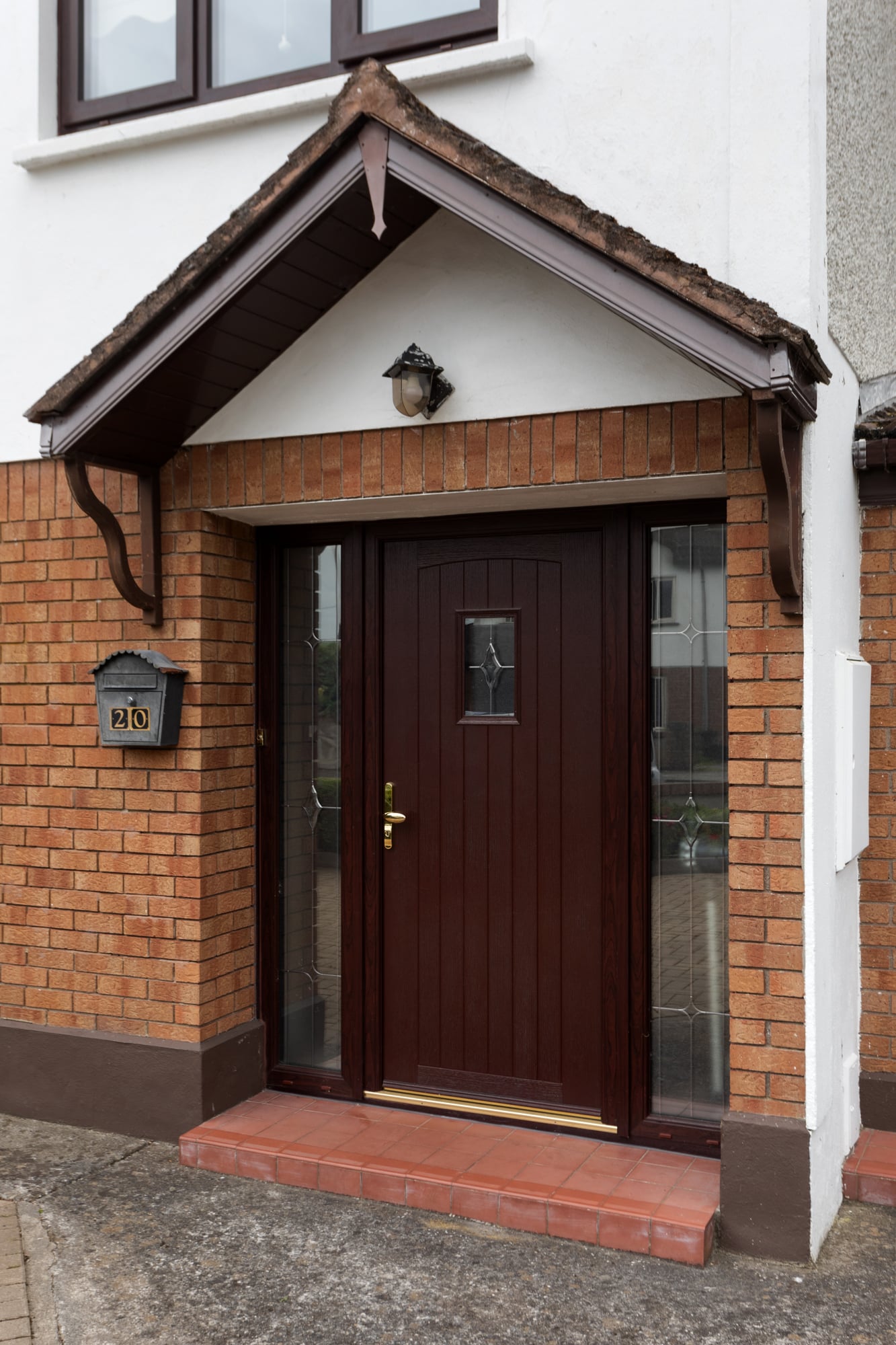 Composite front door and windows in Rosewood