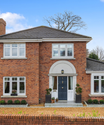 Global Flush Frame windows in white woodgrain transform Ratoath home