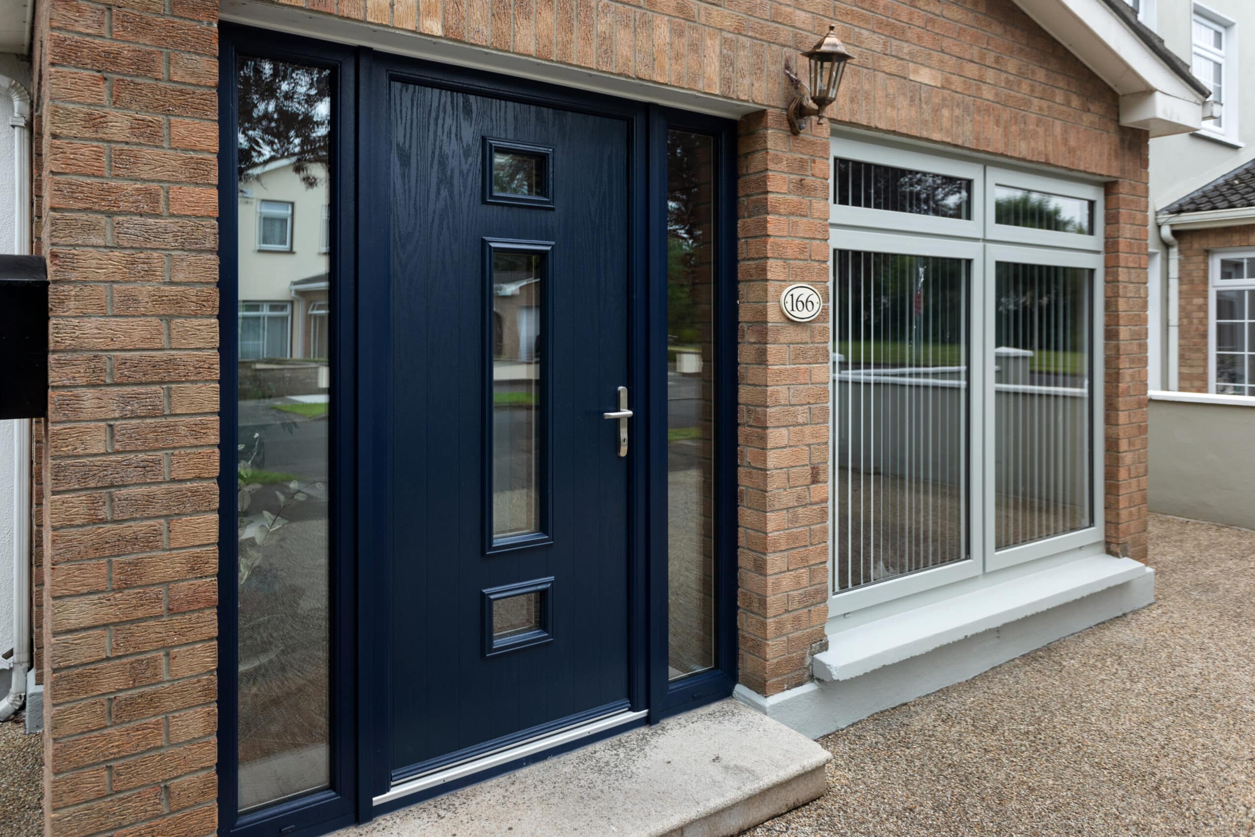 Global Home Improvements Celbridge home featuring Blue Composite front door and Agate Grey windows