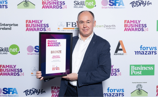 Barry Shevlin with GLOBAL'S Bronze Award for Retail and Wholesale Family Business of the Year